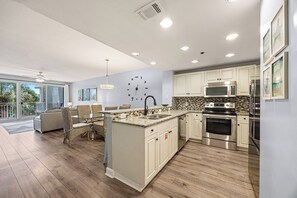 Dishwasher, dining tables - Sterling Shores 203 - Destin, Gulf View, Heated Community Pool, Exercise Room! (Destin)