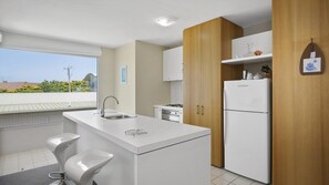 Fridge, dishwasher, toaster, cookware/dishes/utensils - Apartment 9 Kalimna - Ocean Views And Short Stroll To Town. (Lorne)