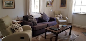 LCD TV, fireplace, DVD player, books