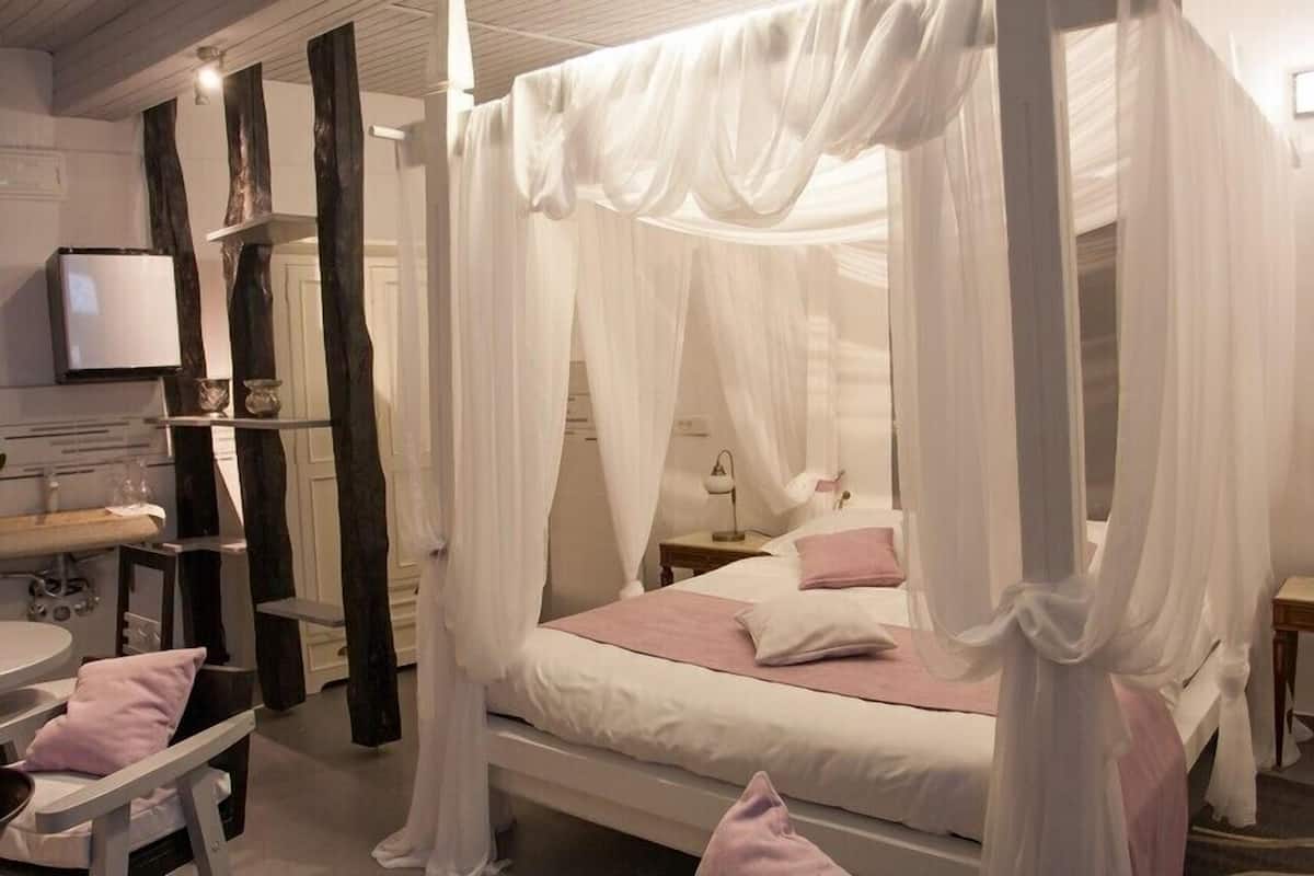 Premium bedding, down duvets, pillow-top beds, in-room safe