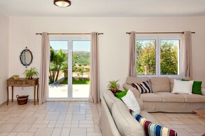 Deluxe Villa, 4 Bedrooms, Private Pool | Living area - Villa Korini (Mylopotamos)
