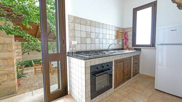 Frigorifero, forno, piano cottura, macchina per tè/caffè