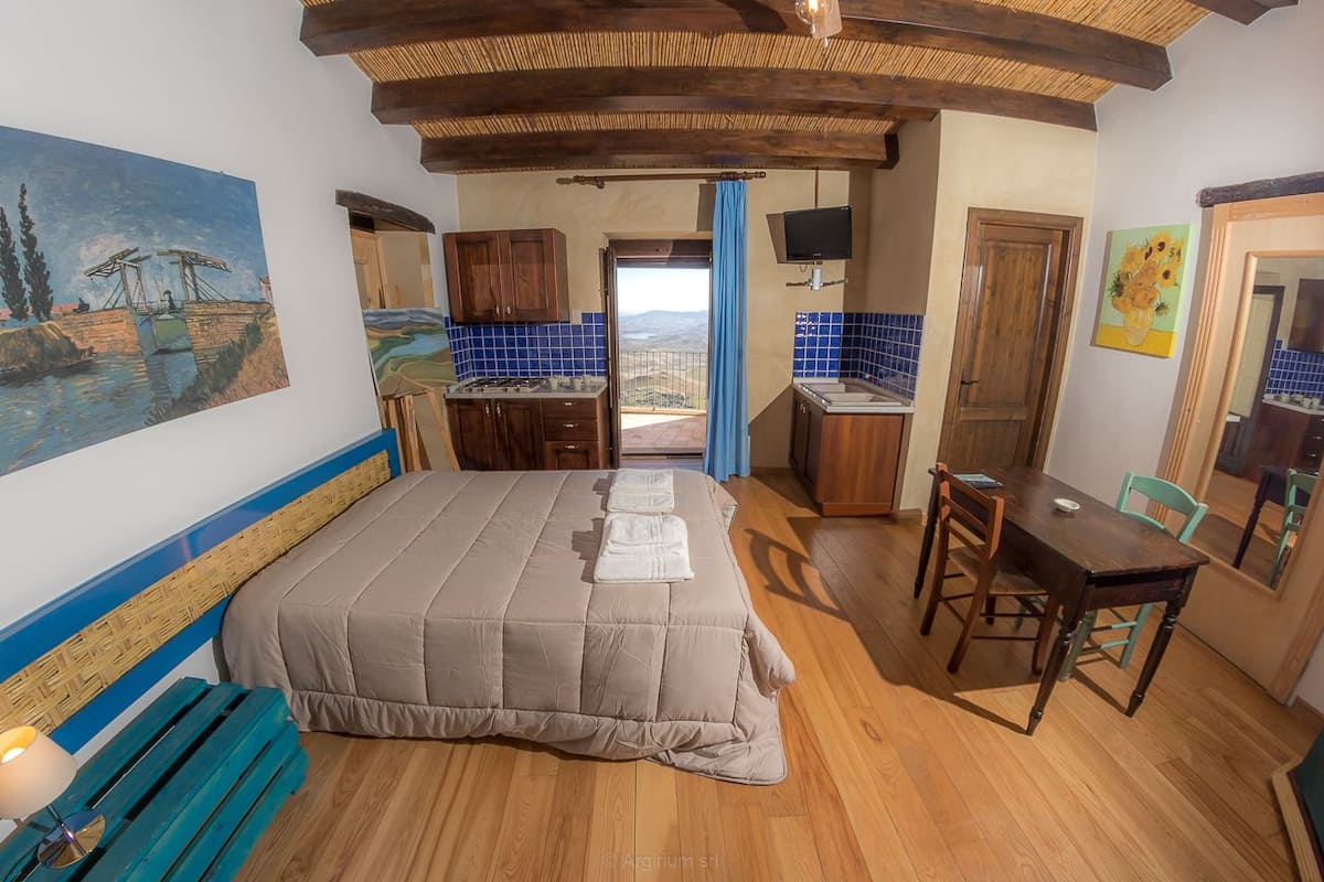 Departamento básico, vista al lago (Bufalino) | Cunas gratuitas, camas extra, wifi gratis y ropa de cama