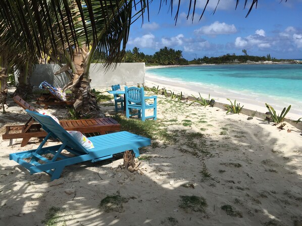 On the beach, sun-loungers, beach towels