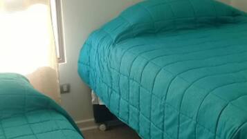 Family Apartment, 3 Bedrooms, Non Smoking, Private Bathroom | 3 bedrooms, free WiFi, bed sheets