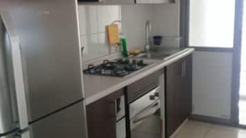 Family Apartment, 3 Bedrooms, Non Smoking, Private Bathroom | Private kitchen | Full-size fridge, microwave, oven, cookware/dishes/utensils