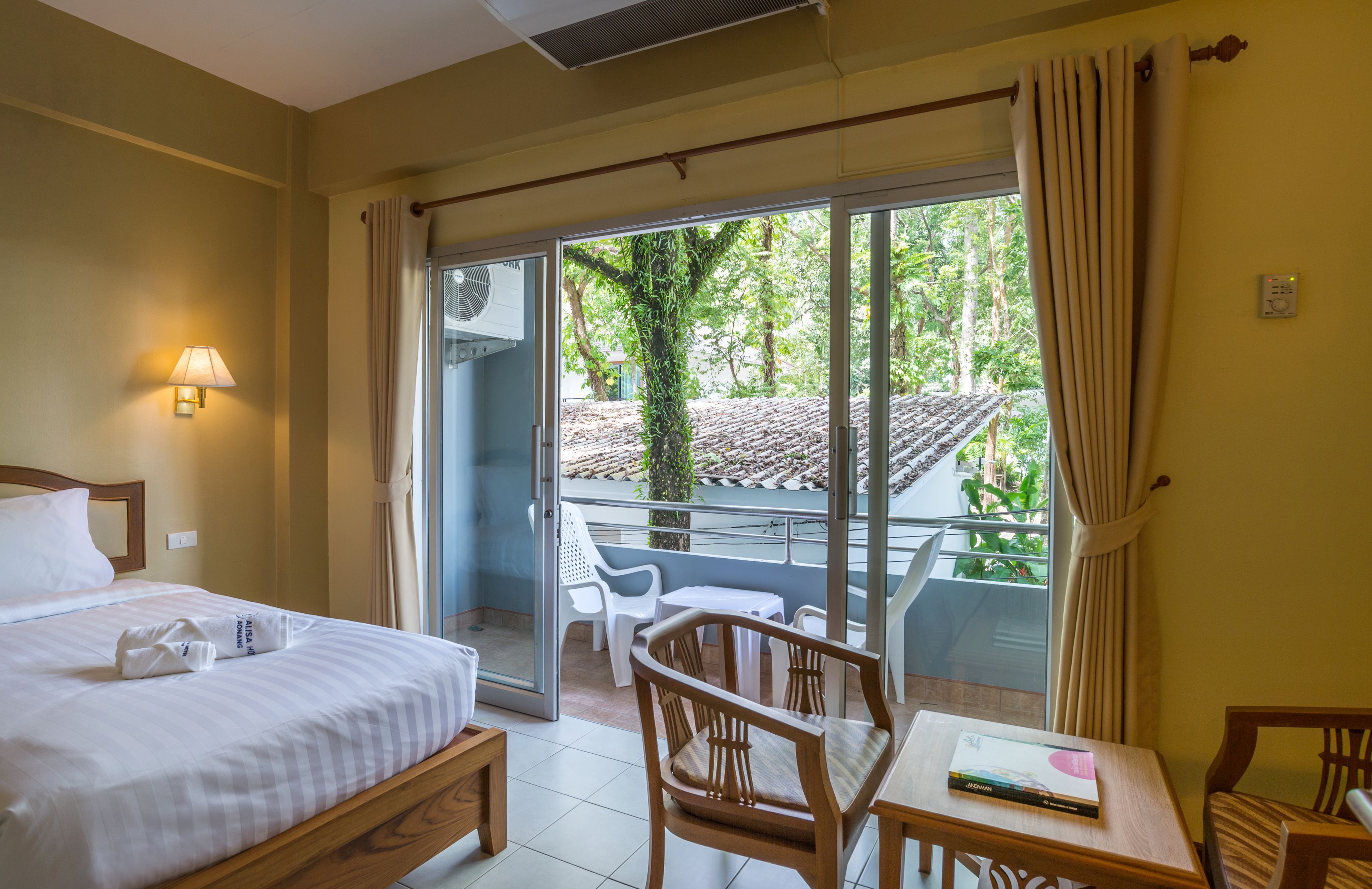 superior twin room with garden view | 1 bedroom, in-room safe, desk, laptop workspace