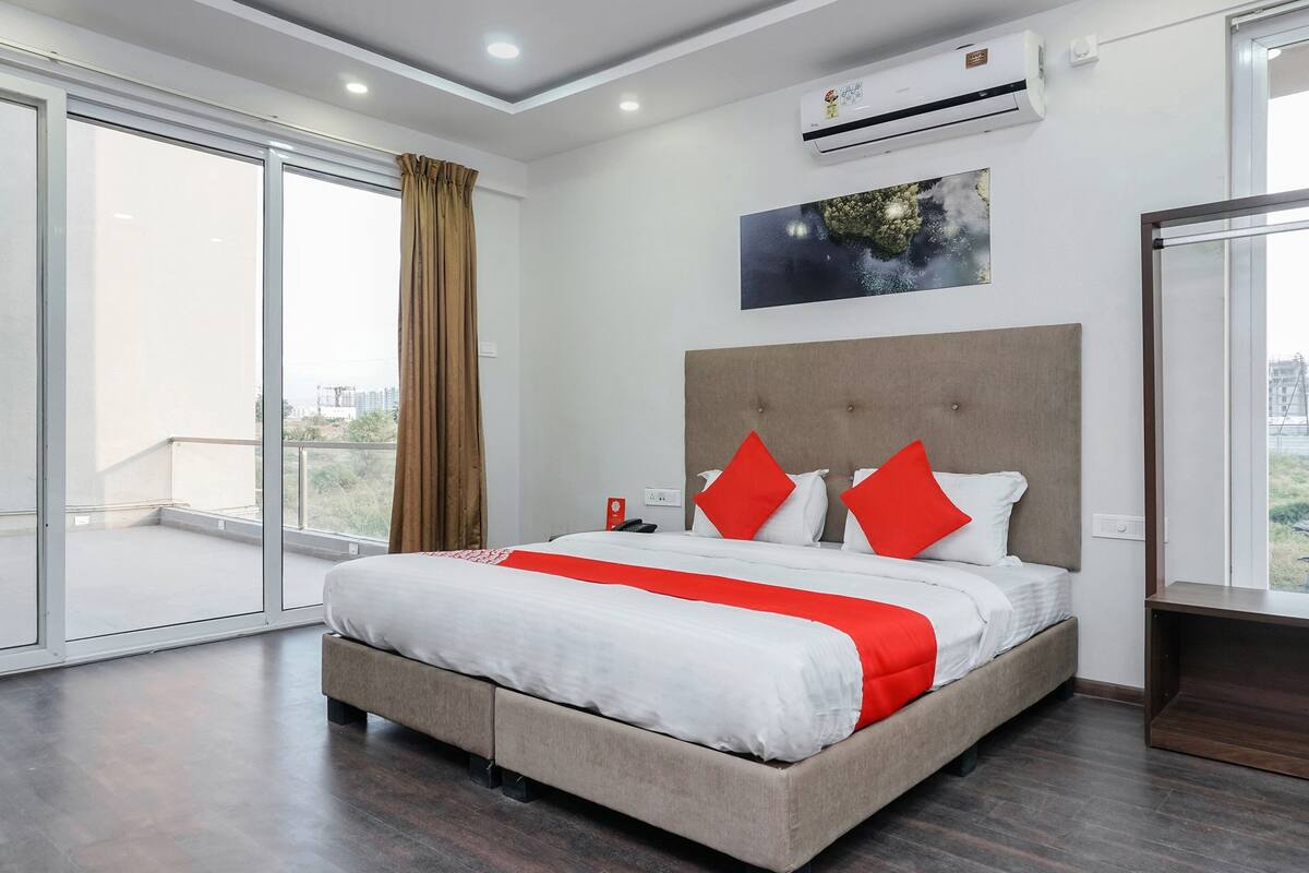 Chambre Deluxe double ou avec lits jumeaux, 1 très grand lit | Literie fournie