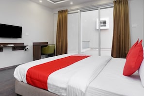 Chambre Deluxe double ou avec lits jumeaux, 1 très grand lit | Literie fournie