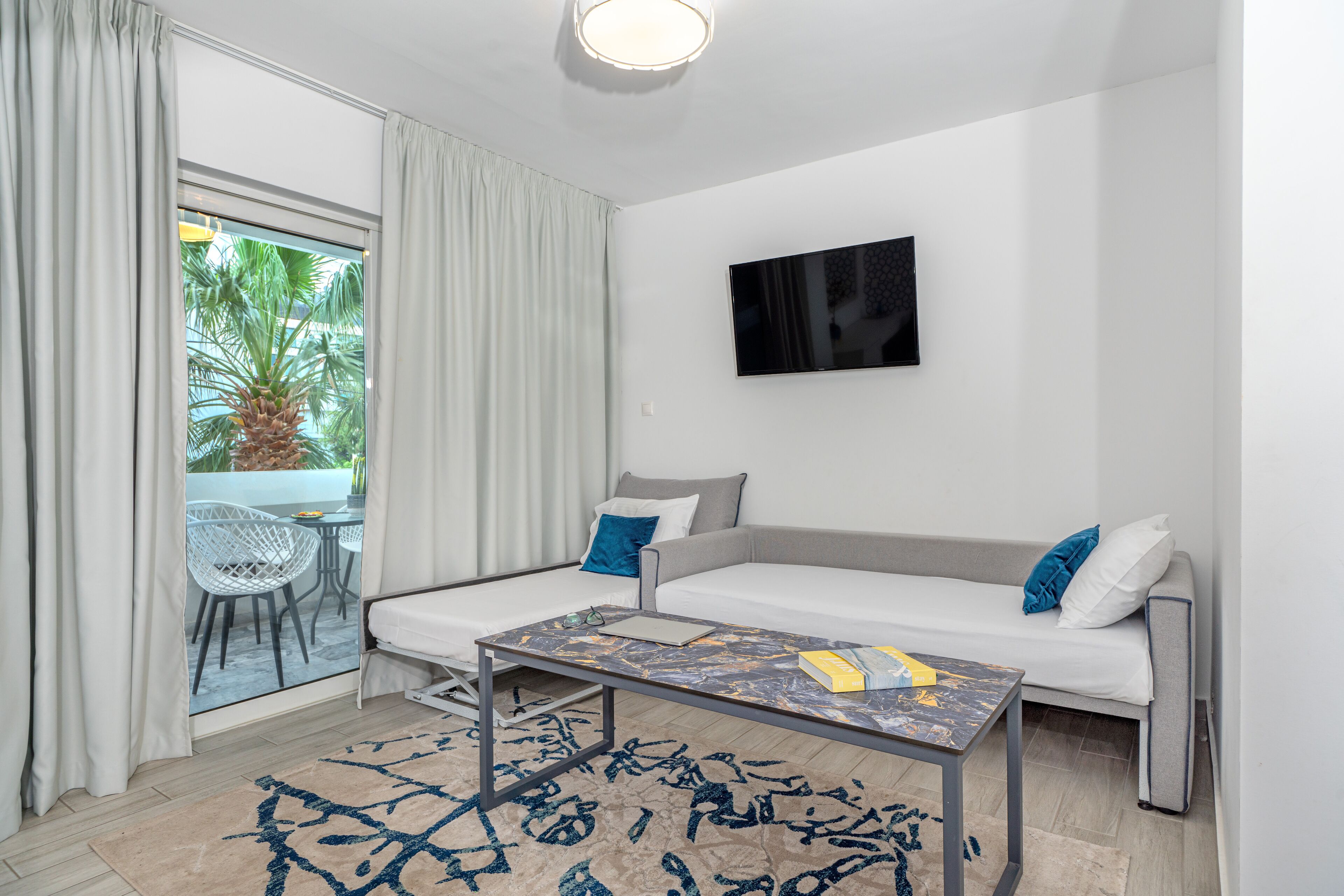 family suite, partial sea view | 1 bedroom, minibar, in-room safe, individually decorated