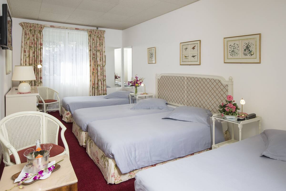 Standard Quadruple Room, Multiple Beds, Non Smoking | Down comforters, minibar, blackout drapes, WiFi (free)