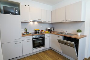 Executive Apartment, 1 Bedroom | Private kitchen | Full-size fridge, microwave, oven, stovetop