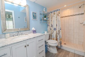 Bathtub, hair dryer, towels