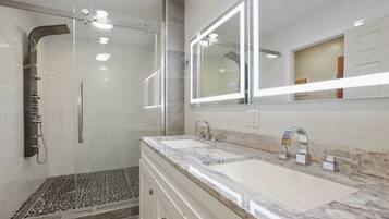 Combined shower/tub, hair dryer, towels, soap