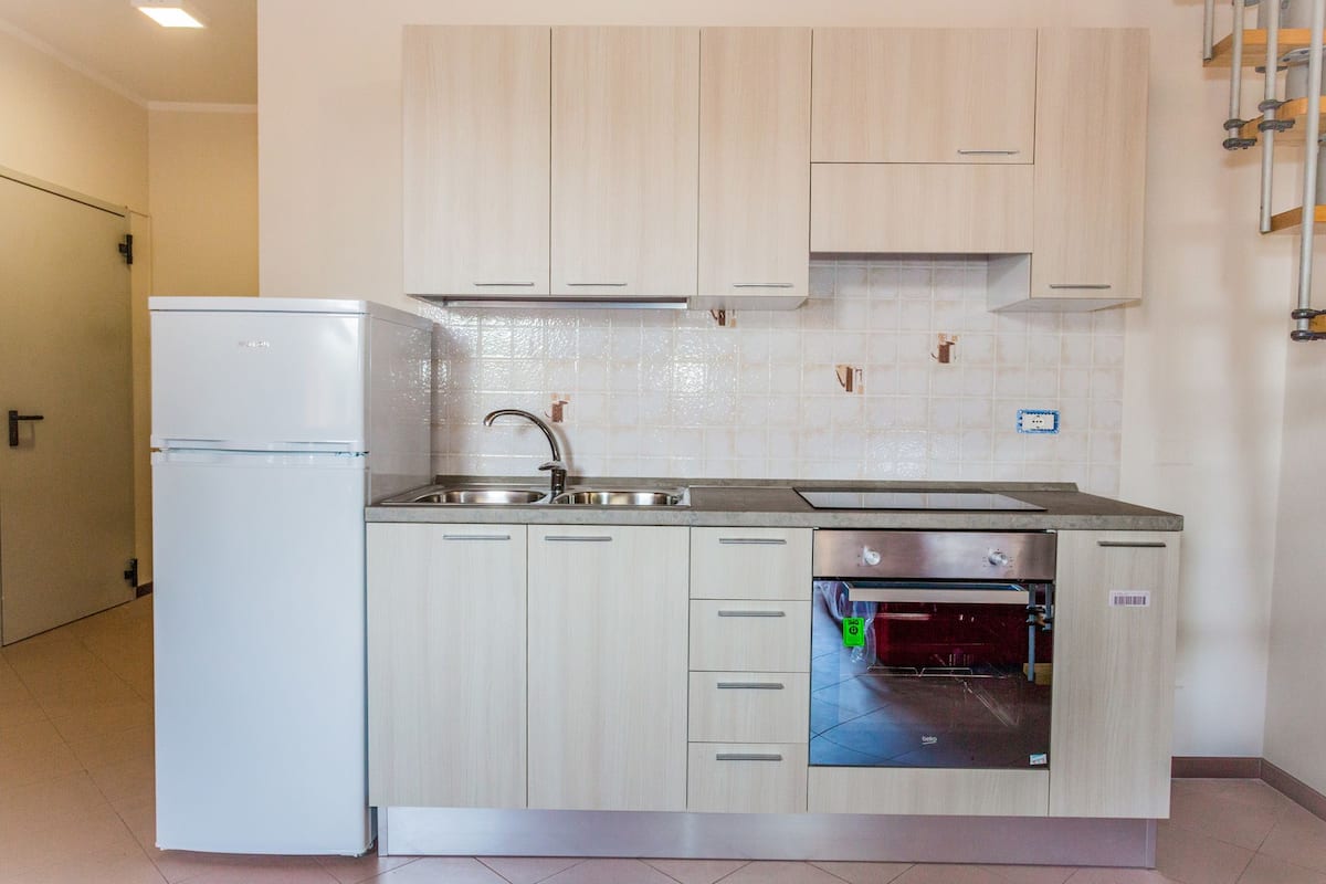 Family Condo, Private Bathroom | Private kitchen | Fridge, microwave