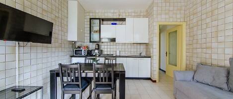 Apartment, 1 Queen Bed with Sofa bed, Non Smoking, Garden View | Living area | Flat-screen TV