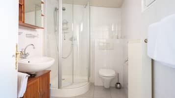 Shower, free toiletries, hair dryer, towels