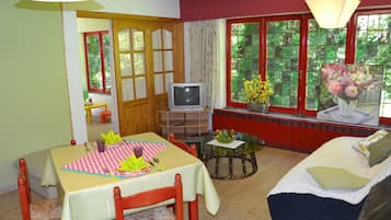 Apartment, 2 Bedrooms | Living area | Flat-screen TV