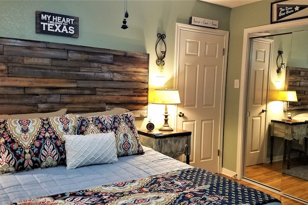 Master with half bath and custom made headboard, huge closet with mirrors