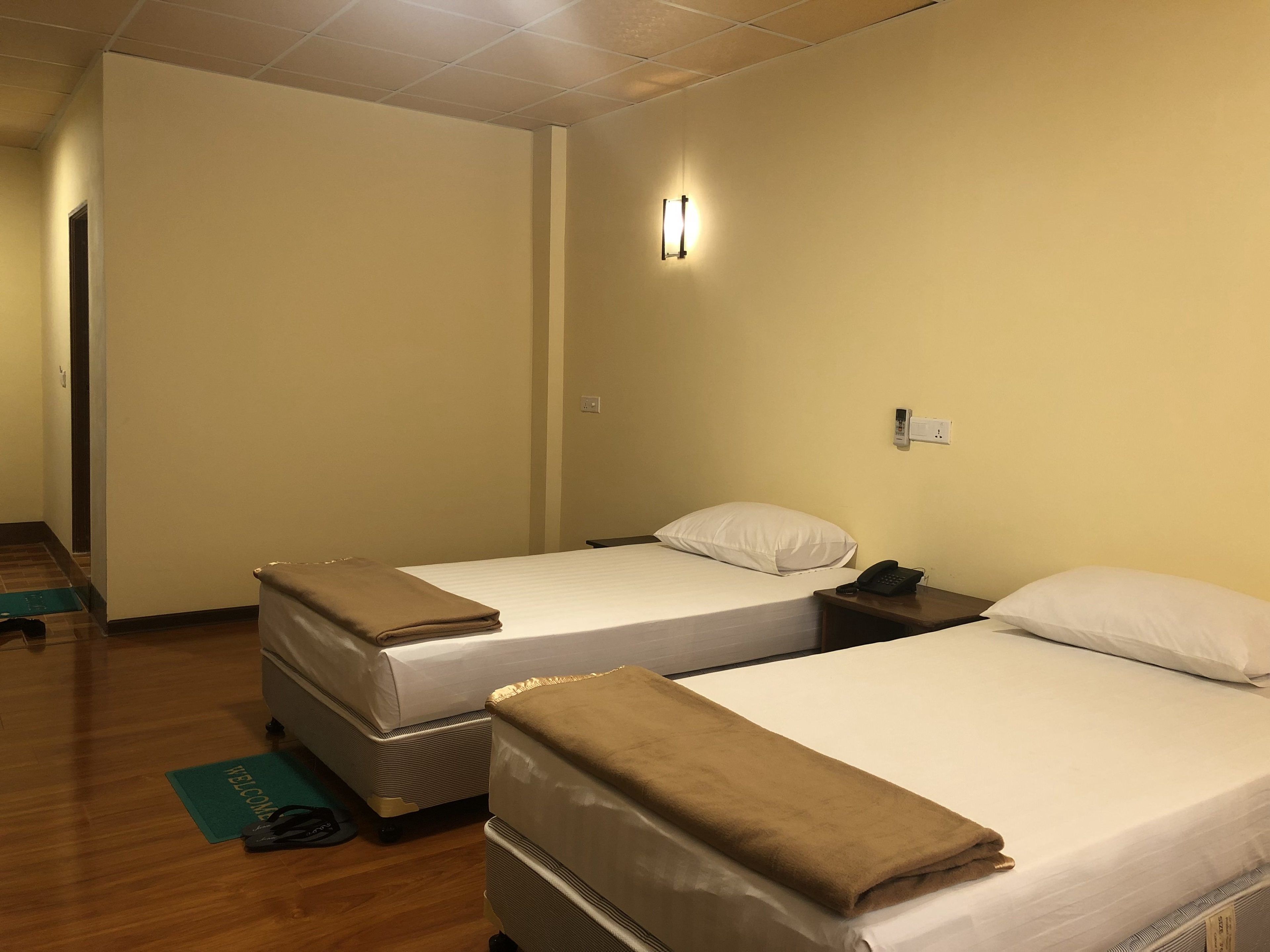 Desk, blackout drapes, bed sheets