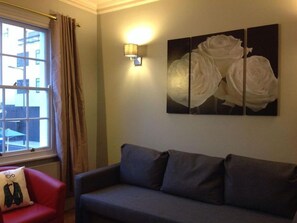 Kamer, 1 twee- of 2 eenpersoonsbedden, 2 eenpersoonsbedden, toegankelijk voor mindervaliden | Woonkamer