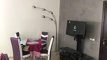 Apartment, 2 Bedrooms | Living room | Flat-screen TV