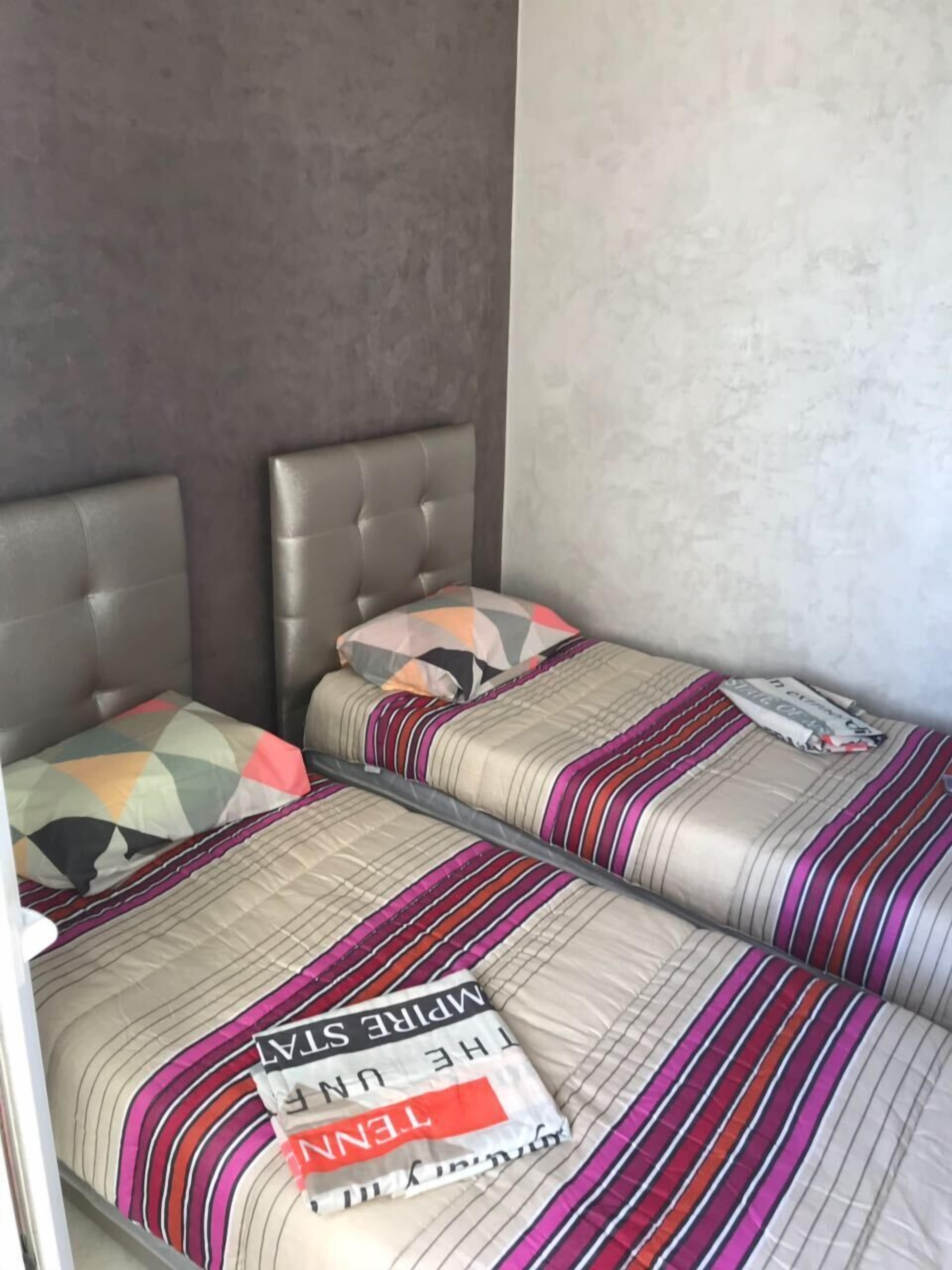 2 bedrooms, blackout curtains, iron/ironing board, cots/infant beds