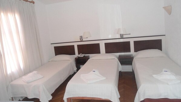 Blackout drapes, WiFi (free), bed sheets