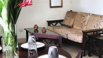 Apartment, 2 Queen Beds, Non Smoking | Living area | 40-inch flat-screen TV with cable channels, TV