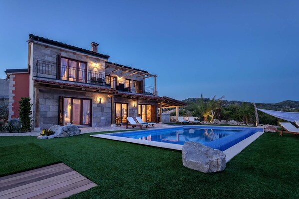 Front of property - evening/night