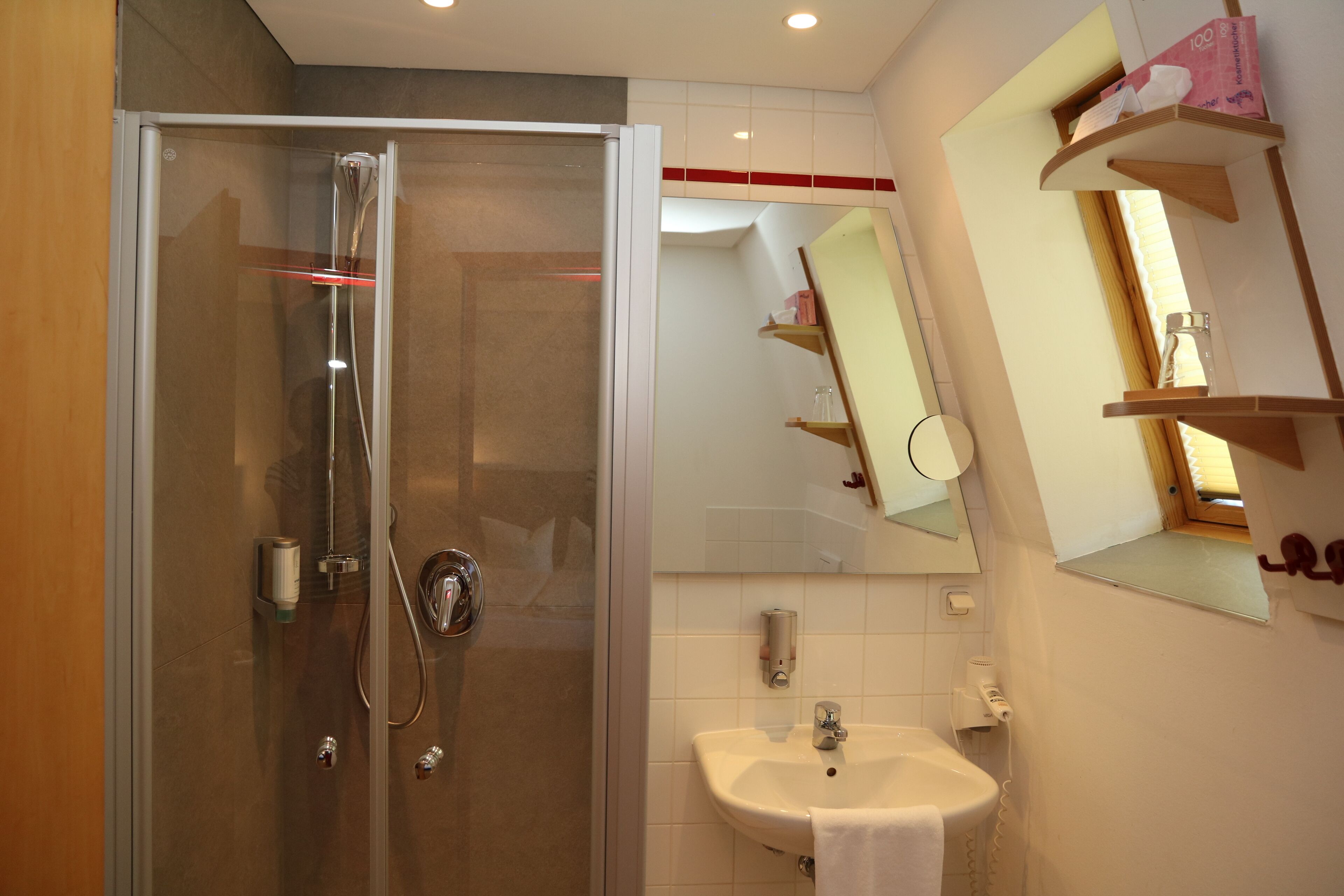 single room | bathroom | shower, hair dryer, towels, soap