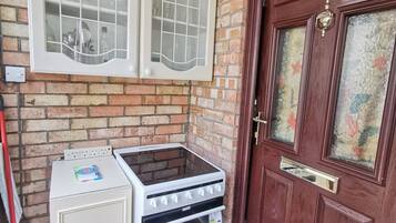 Studio, 1 Bedroom | Private kitchen | Full-size fridge, microwave, oven, stovetop