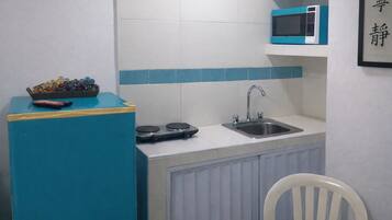 Design Triple Room, 1 Double Bed, Non Smoking | Private kitchen