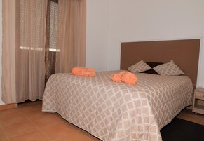 Blackout drapes, iron/ironing board, free WiFi, bed sheets