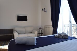 Habitació doble Deluxe, vistes al mar | Llençols de cotó egipci, cobrellits i matalassos d'escuma viscoelàstica 