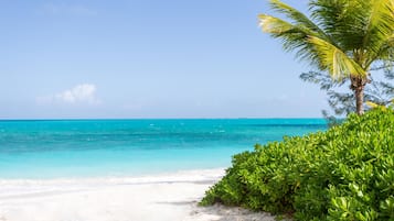 On the beach, sun-loungers, beach towels
