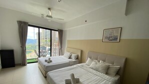 A hotel room with two beds, a ceiling fan, a large window with curtains, and a painting on the wall. - Midhills at Genting by Self Check In (Genting Highlands)