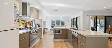 Fridge, microwave, dishwasher, coffee/tea maker