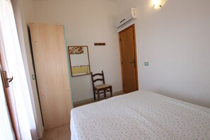 2 dormitorios, tabla de planchar con plancha, wifi gratis y ropa de cama