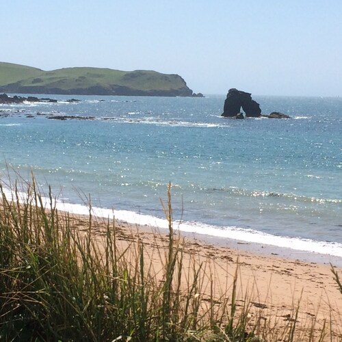 Private lodge close to beaches in tranquil gardens