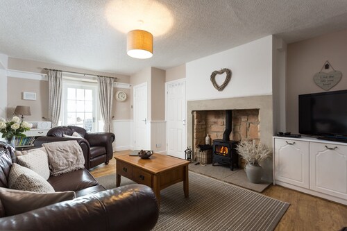 Cosy cottage with delightful private garden and summerhouse.