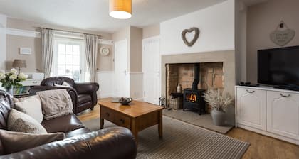 Cosy cottage with delightful private garden and summerhouse.