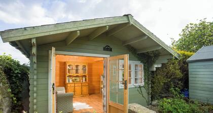 Cosy cottage with delightful private garden and summerhouse.