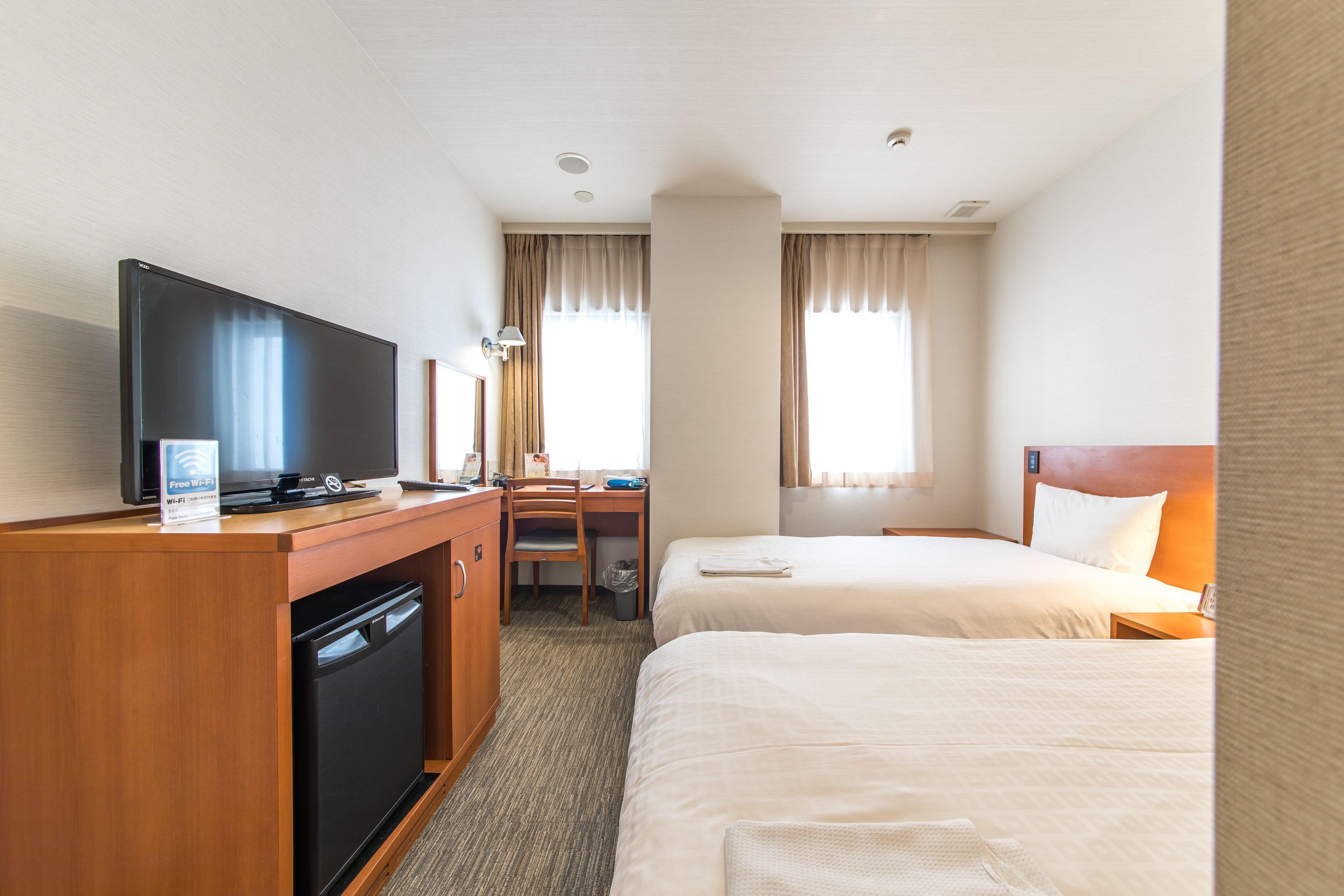 economy twin room, non smoking | desk, laptop workspace, blackout curtains, soundproofing