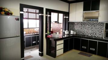 Apartment, 4 Bedrooms, River View | Private kitchenette | Full-sized fridge, microwave, stovetop, coffee/tea maker