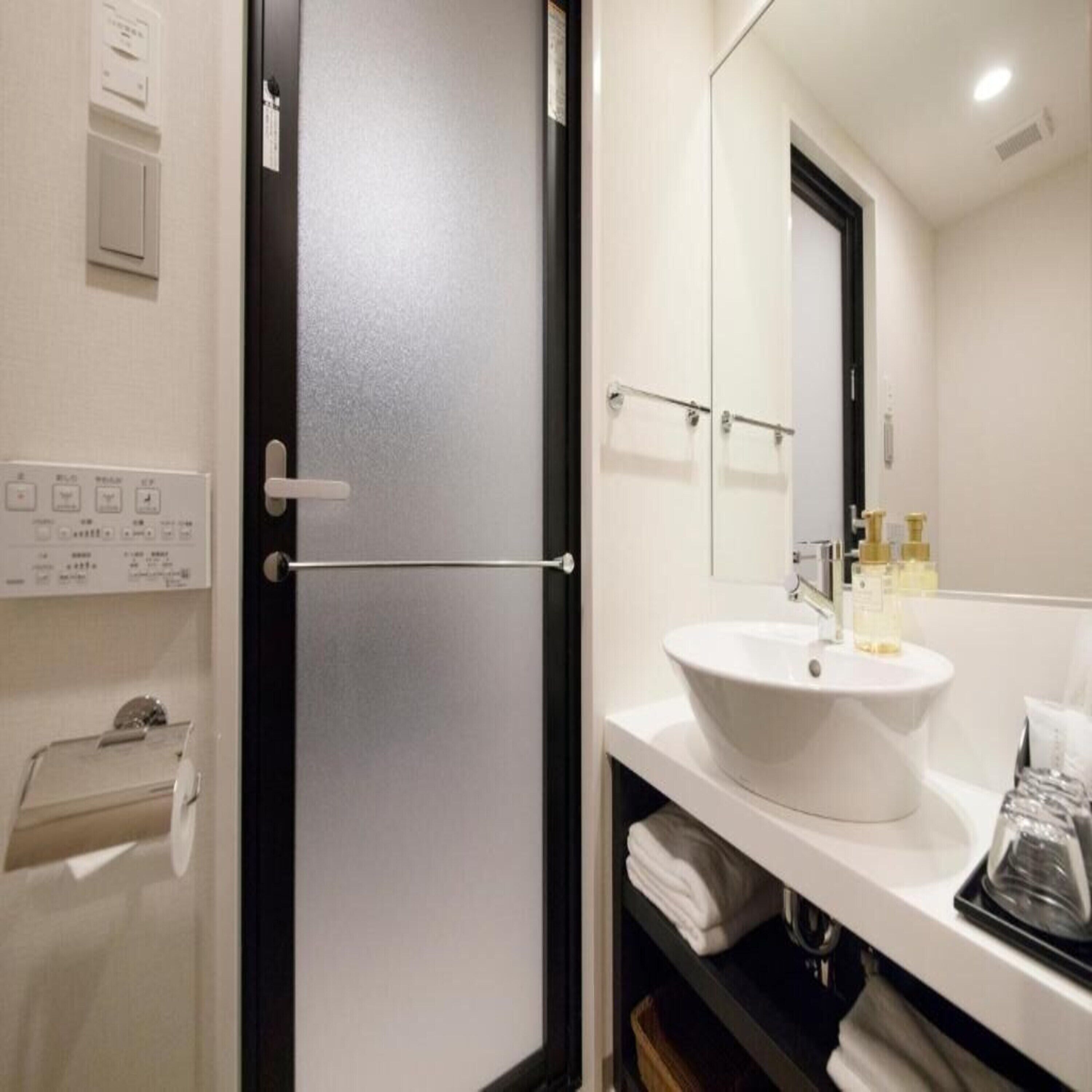 separate bathtub and shower, free toiletries, hair dryer, slippers