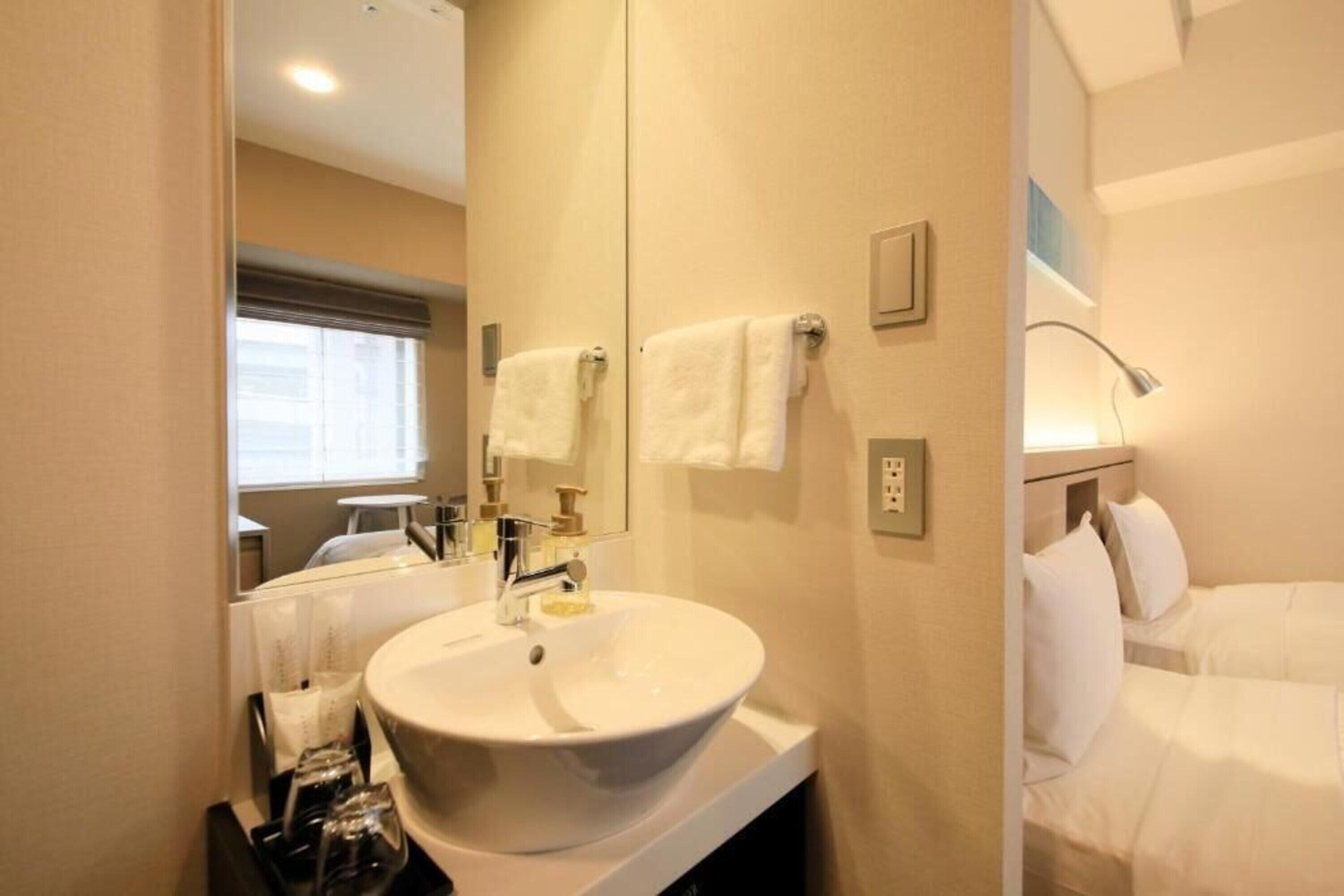 separate bathtub and shower, free toiletries, hair dryer, slippers