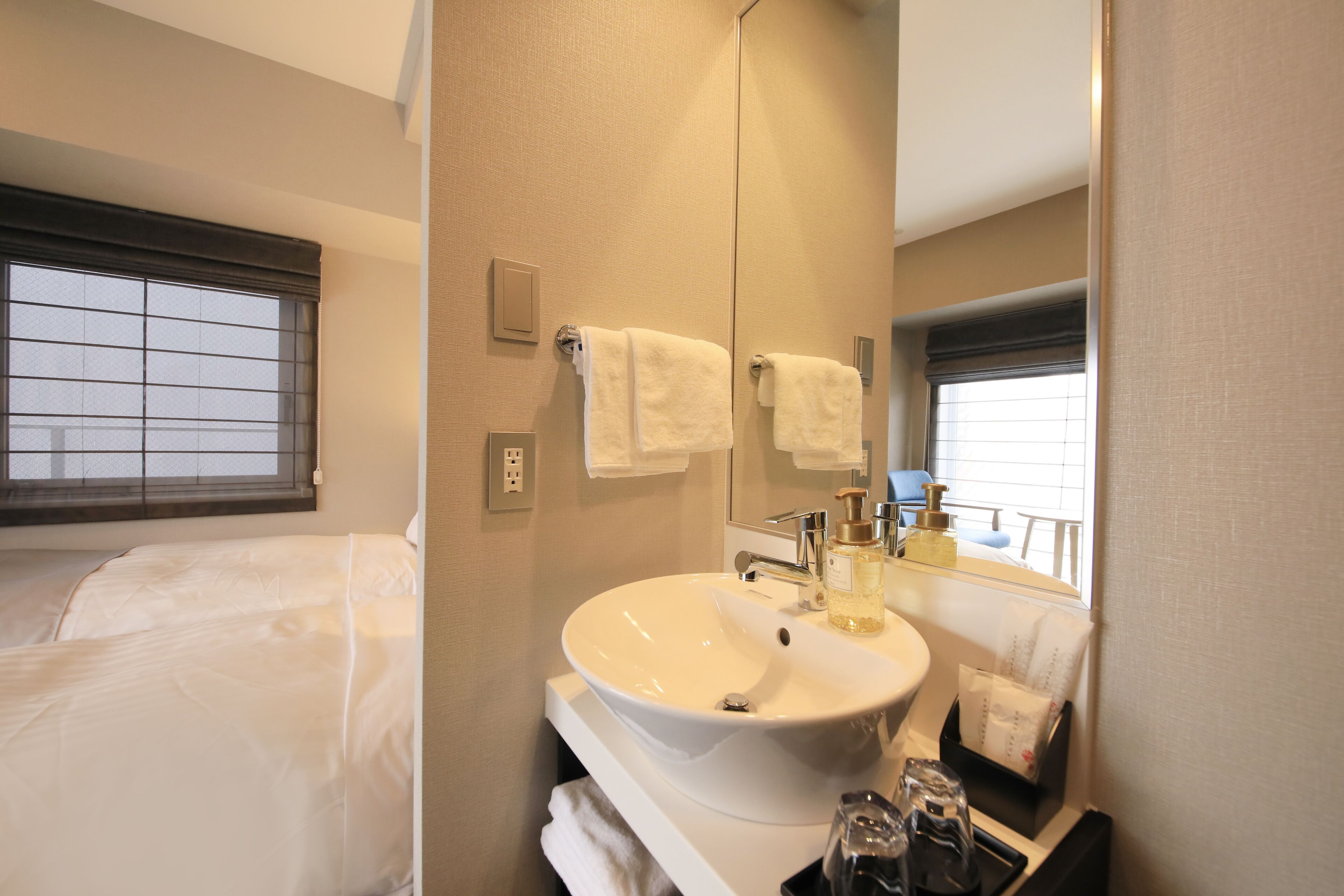 twin room, non smoking, corner | bathroom | separate bathtub and shower, free toiletries, hair dryer, slippers