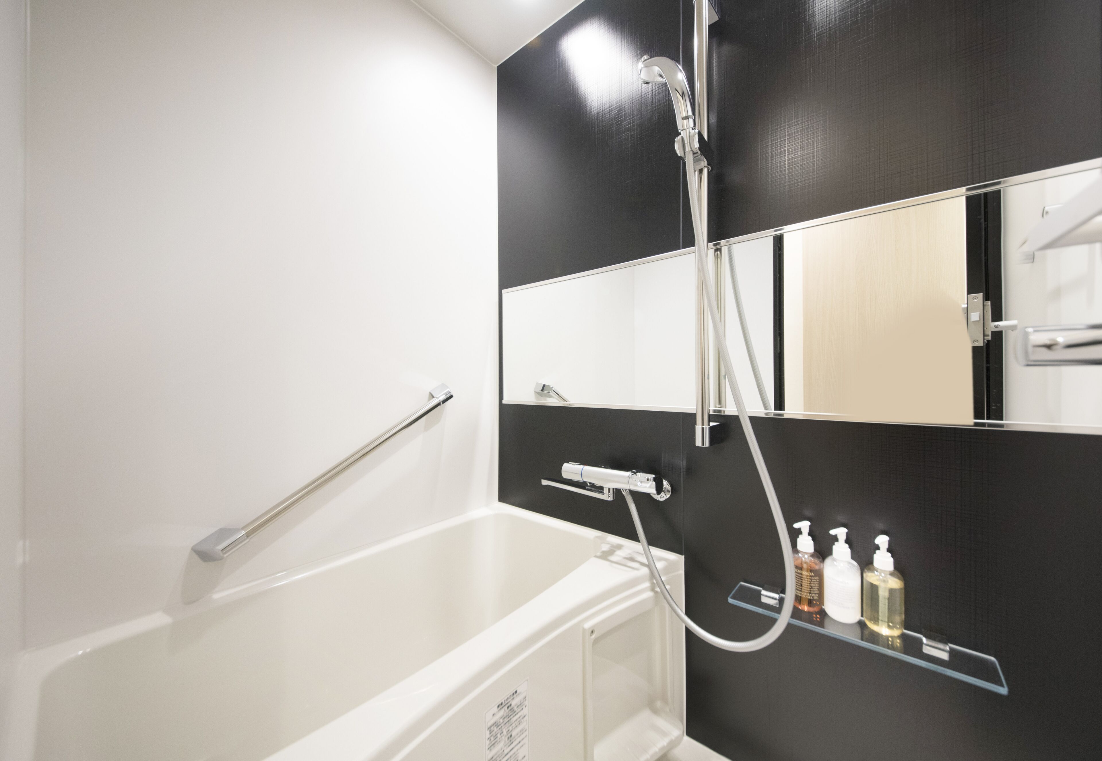 separate bathtub and shower, free toiletries, hair dryer, slippers