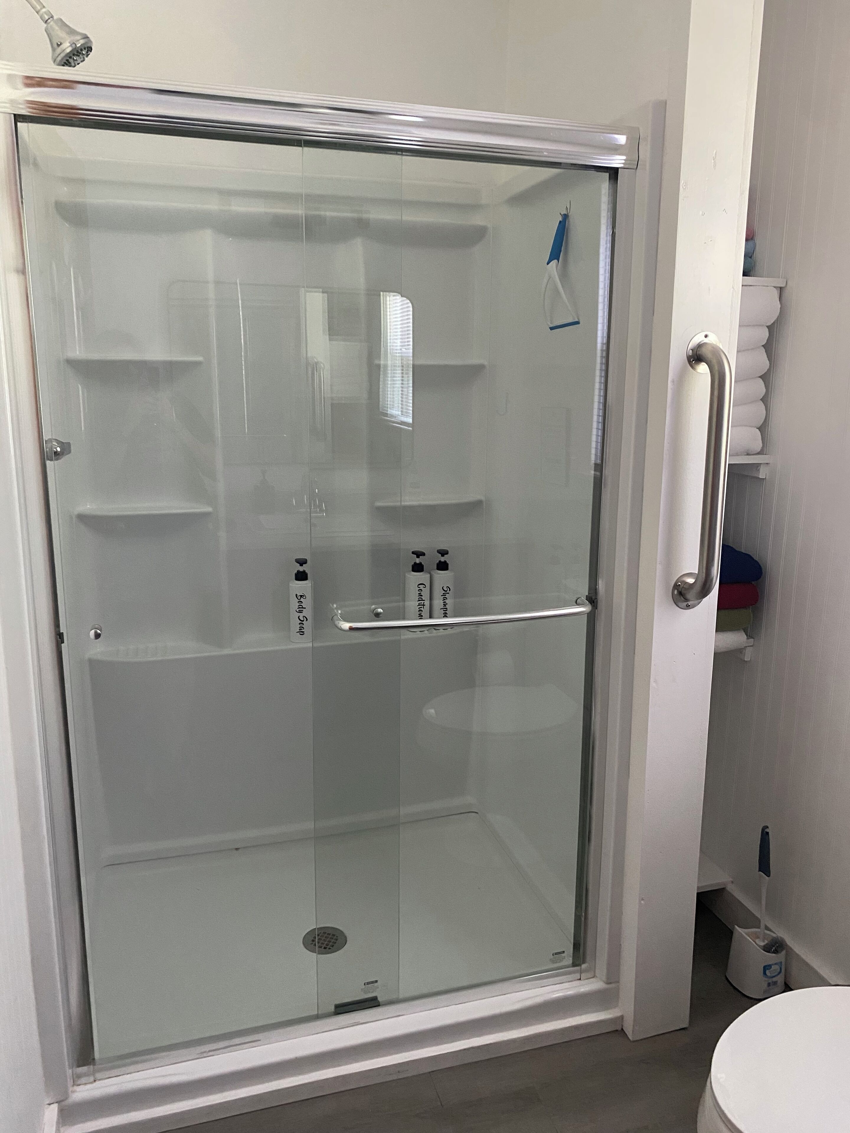 Combined shower/bathtub, hair dryer, towels, soap